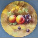 A Royal Worcester plate, painted with fruit to a mossy ground by H H Price, diameter 6.5ins - Very