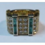 An 18ct gold diamond and emerald ring, weight 15g