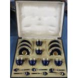 A cased set of Royal Worcester cups and saucers, in a cobalt blue named Viking enamel to the box,