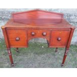 A small 19th century sideboard, fitted with two deep drawers flanking a central drawer, raised on
