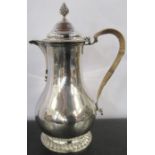 A Victorian silver coffee pot, with wicker insulated handle, London 1886, maker Charles Stuart