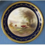 A Royal Worcester plate, painted with lowland cattle by John Stinton, diameter 9ins