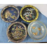 Three Carlton Ware bowls, raised on three gilt feet, one decorated with butterflies, together with