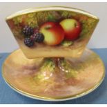 A Royal Worcester painted matchstick holder, the holder raised on a pedestal to a circular dish,