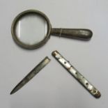 A silver framed magnifying glass, Chester 1926, together with a silver bladed pocket knife with