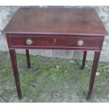 A Georgian mahogany single drawer side table, raised on square tapering legs, with brass ring
