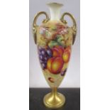 A Royal Worcester pedestal vase, the front decorated with fruit to a mossy background by Freeman,
