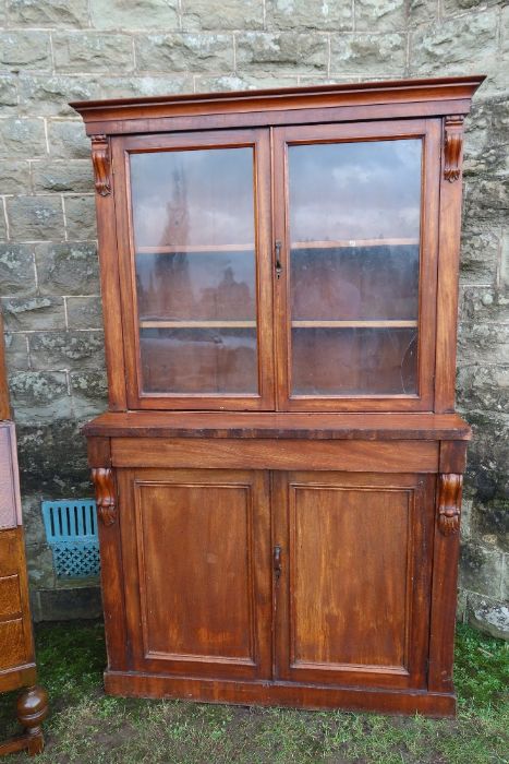 A 19th century mahogany bookcase cupboard, the upper section with two glazed drawers over a drawer - Image 2 of 3