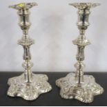 A pair of Georgian loaded candlesticks, with gadrooning to the knopped stem, Sheffield 1827, maker S