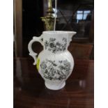 A Royal Worcester Centenary jug, printed with a view of the factory and coats of arms, height 5ins