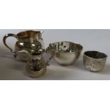 A silver jug, London 1977, weight 5oz, together with a silver bowl, a small jug with embossed