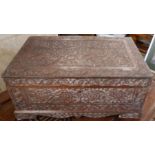 A Victorian Anglo-Indian foliate carved teak dressing box, the fitted interior having compartments