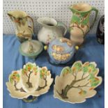 A collection of Carlton Ware, with moulded decoration, to include dishes, jugs, biscuit barrel,