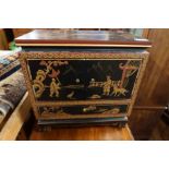 A Japanese lacquer table cabinet, fitted with two doors opening to reveal drawers, with drawer