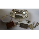 A pierced silver basket, of rectangular form, af, weight 3oz, together with a small silver funnel,