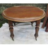 A 19th century mahogany circular extending dining table, no leaves, diameter 48ins, height 29ins