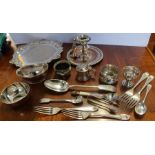 A collection of silver plated items, to include a salver, a Sheffield plate chamberstick, flatware