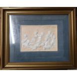 A framed relief pottery plaque, in pink and white, of putti and nymphs, 4.25ins x 6.25ins