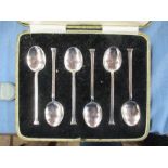 A cased set of six coffee spoons, together with a silver Kings pattern handled cake knife and a