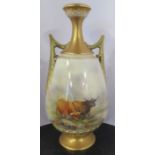 A Royal Worcester twin handled vase, decorated with Highland cattle in a landscape by J Stinton,