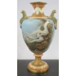 A Royal Worcester pedestal vase, the front decorated with swans in flight by C H C Baldwyn, the back