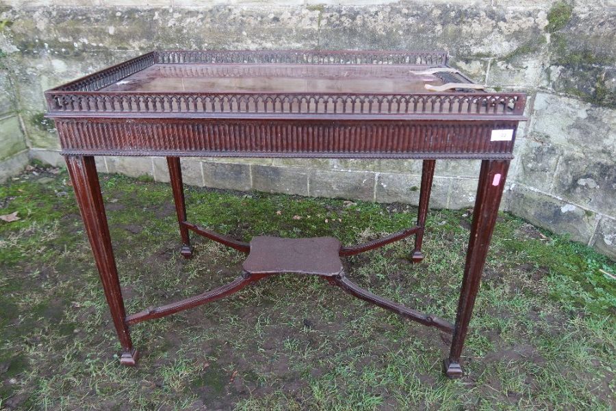 A Georgian design silver table, with arched pierced gallery, af, fluted frieze and raised on four