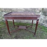 A Georgian design silver table, with arched pierced gallery, af, fluted frieze and raised on four