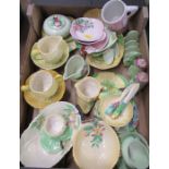 A collection of Carlton Ware leaf molded pieces, to include toast rack, condiment pots, jug, jam