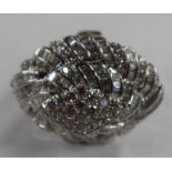 A diamond dress ring, with marquise shape mount, set numerous baguette and round brilliant cut