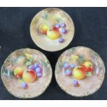 Three Royal Worcester pin dishes, all decorated with fruit to a mossy background by Roberts,