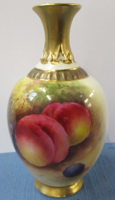 A Royal Worcester vase, painted to the front with fruit by Mosley, shape number 286, height 4.