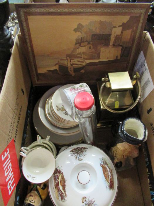 A mixed box of items, to include an inlaid picture, toby jug, Royal Worcester tea cups and saucers