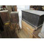 A chest of drawers, tool box, two units and two stools