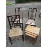 A nest of tables, a pair of chairs and a rush seated country chair and a mid century next of two