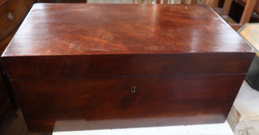 A large late 18th century Georgian mahogany writing slope, with brass flash handles and side drawer