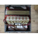 A cased Hohner accordion