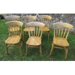 A set of six pine kitchen chairs