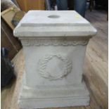 A concrete garden plinth, 12ins x 12ins, height 16ins