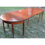 A 19th century mahogany D end dining table, formed as a drop leaf table, leaf and a pair of D