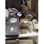 A collection of clocks, to include wall clock, three mantle clocks, together with two hot water