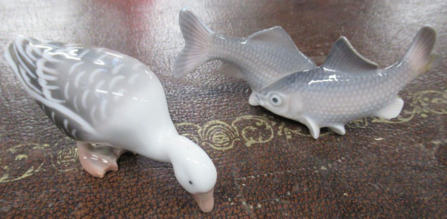 A Royal Copenhagen model, of two fish, af, numbered 2870, together with another of a duck