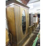 An Edwardian mirror door wardrobe, width 48ins, height 80ins