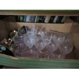 A box of assorted glassware, together with a brass lamp base