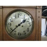 An oak cased regulator style clock, in two sections, height 75ins