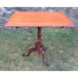 A Victorian mahogany rectangular tilt top table, on turned column, 32ins x 25.5ins, height 28ins -