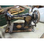 A Jones' Sewing machine, together with a set of Libra Scales and a set of postal scales and weights