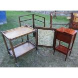 A group of furniture, to include two clothes rails, a tea trolley, a fire screen and a sewing box