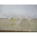 Five cut glass wine glasses