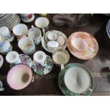 Five 19th century coffee cans, to include Spode, together with a pair of candlesticks, two cups