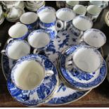 A Royal Crown Derby tea set decorated in blue and white with an Oriental pattern together with a
